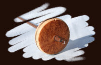Amboyna Burr on Sycamore with Walnut shaft.  Rim banded / weighted