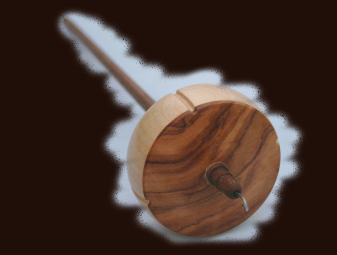 Wild Olivewood on Sycamore with Walnut shaft